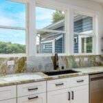 Smith Mountain Lake Home Remodel - Kitchen Remodel with sink and granite backsplash